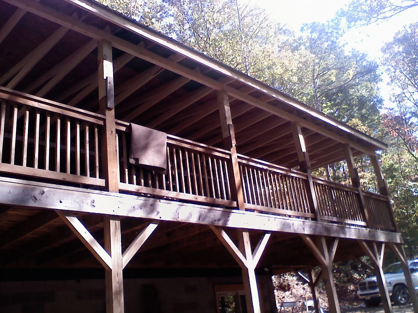 Timber framing under a new elevated porch and deck — Roof Leak Repair in Rome by Roofing Brothers